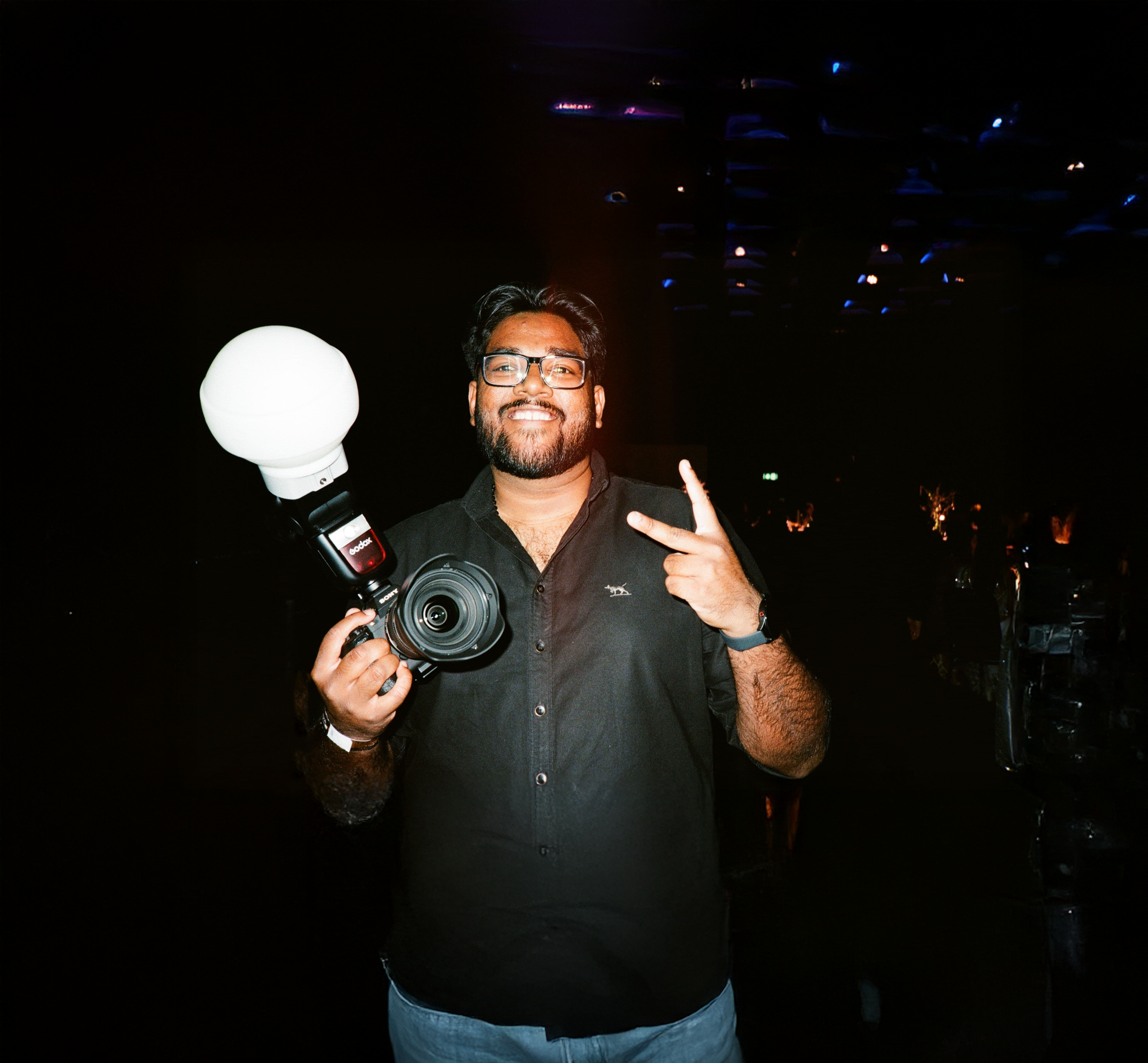 Edwin holding his camera